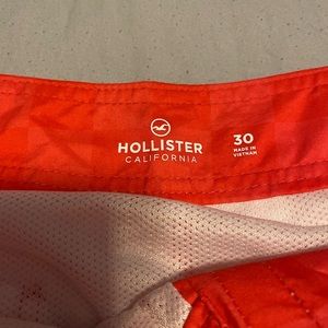 Neon Hollister swim trunks